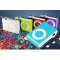 Mini MP3 Music Player with Metal Case, Clip, Earphones and USB Cable.