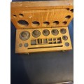 Brass analytical weights in original box. Some missing.