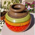 A LARGE COLOURFULL ETHNIC TRIBAL BELLY CERAMIC BASE