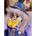 CREEPY CLOWN DOLL WITH PLASTIC FACE AND SAWDUST FILLED BODY