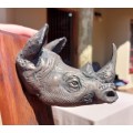 WHITE RHINO HENKMAM CLAY SCULPTURE WITH BRONZE COATING ON WOODEN WALL MOUNT