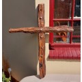 HANDMADE WOODEN CROSS DECORATED WITH NAILS AND VARNISH COATED