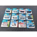 HOTWHEELS COLLECTION OF 12 DIECASTS IN ORIGINAL PACKAGING EARLY 2000 TO 2017 MODELS