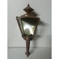 Two very rustic and well used wall mounted lamps with bevel type glass