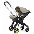 Doona Baby Car Seat & Stroller - Dune (Beige) + FREE gift