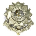 The Bedfordshire and Hertfordshire regiment cap badge with slide