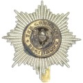The Cheshire regiment cap badge with slide
