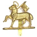 The Royal West Surrey regiment cap badge with slide