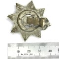 The Devonshire regiment cap badge with broken slide - Kings Crown