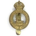 The Hertfordshire regiment cap badge with slide - King`s crown