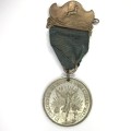 1910 Union of South Africa commemoration medallion with springbok clip
