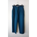 Teal green high-waisted trousers
