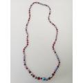 Long red Aurora Borealis bead necklace