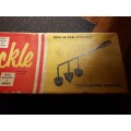 Vintage Snackle in its original box with instructions