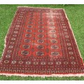 Bukhara Persian carpet - lovely old character piece - worn, faded, threadbare in places