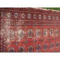 Bukhara Persian carpet - lovely old character piece - worn, faded, threadbare in places
