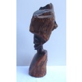 Authenic African wood carving.  Interesting, unique avant-garde dimensions and use of wood.