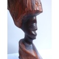 Authenic African wood carving.  Interesting, unique avant-garde dimensions and use of wood.