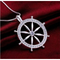 925 stamped silver wheel necklace.