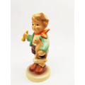 Geobel Hummel figure boy with toy horn and rocking horse #