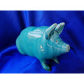 Vintage Turquoise glazed pottery pig in the style of Wemyss
