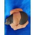Vintage Large Pottery Pig Sleeping on a Chair