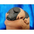 Vintage Large Pottery Pig Sleeping on a Chair