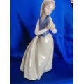 Lladro Nao lady holding her a Chick