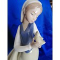 Lladro Nao lady holding her a Chick