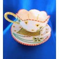 Stunning Hand Painted Cup and Saucer