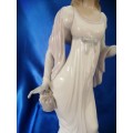 Lladro figurine retired - #04934 Dainty Lady holding a Handkerchief and Purse ###
