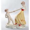 Czechoslovakian earthenware figural group of a dancing mother and child, 1940s
