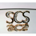 Swarovski Crystal and Gold tone Brooch / Pin of SCS
