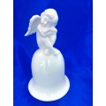 Continental blanc de chine Bell with Cherub sat on top