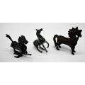 Three Oriental bronze figurines of horse