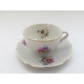 Pretty Demitasse cup and saucer White with flower design and gold trim