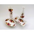 Fine Bone China Cottage Rose set of 4 items with gold trim.