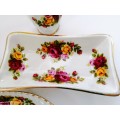 Fine Bone China Cottage Rose set of 4 items with gold trim.