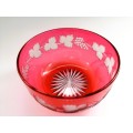 Beautiful engraved cranberry glass bowl decorated with fruiting vine