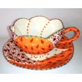 Stunning Hand Painted Bright Orange Duo Cup and Saucer