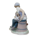 Lladro - This One`s Mine 5376 Figurine  Boy With Dog And Puppies
