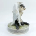 Royal Copenhagen Figurine Of A Faun Playing With A Goat, Model No. 498