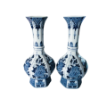 A pair of early 20th century Mosa Maastricht delft blue and white vases