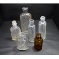 Six Vintage Small Glass Bottles
