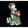 Girl in Green with Flower Basket Figurine.