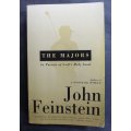 The Majors, In Pursuit of Golf`s Holy Grail by John Feinstein Softcover Book