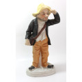 Bearded Old Man with Hat and Coat and Satchel Porcelain Figurine