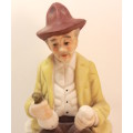 Vintage Porcelain Figurine of Old Man with Wine Bottle and Glass