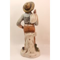 Vintage Porcelain Figurine of Old Man with Knapsack on Shoulder