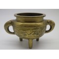 Vintage Chinese solid brass small pot on three legs with dragon motif & elephant handles